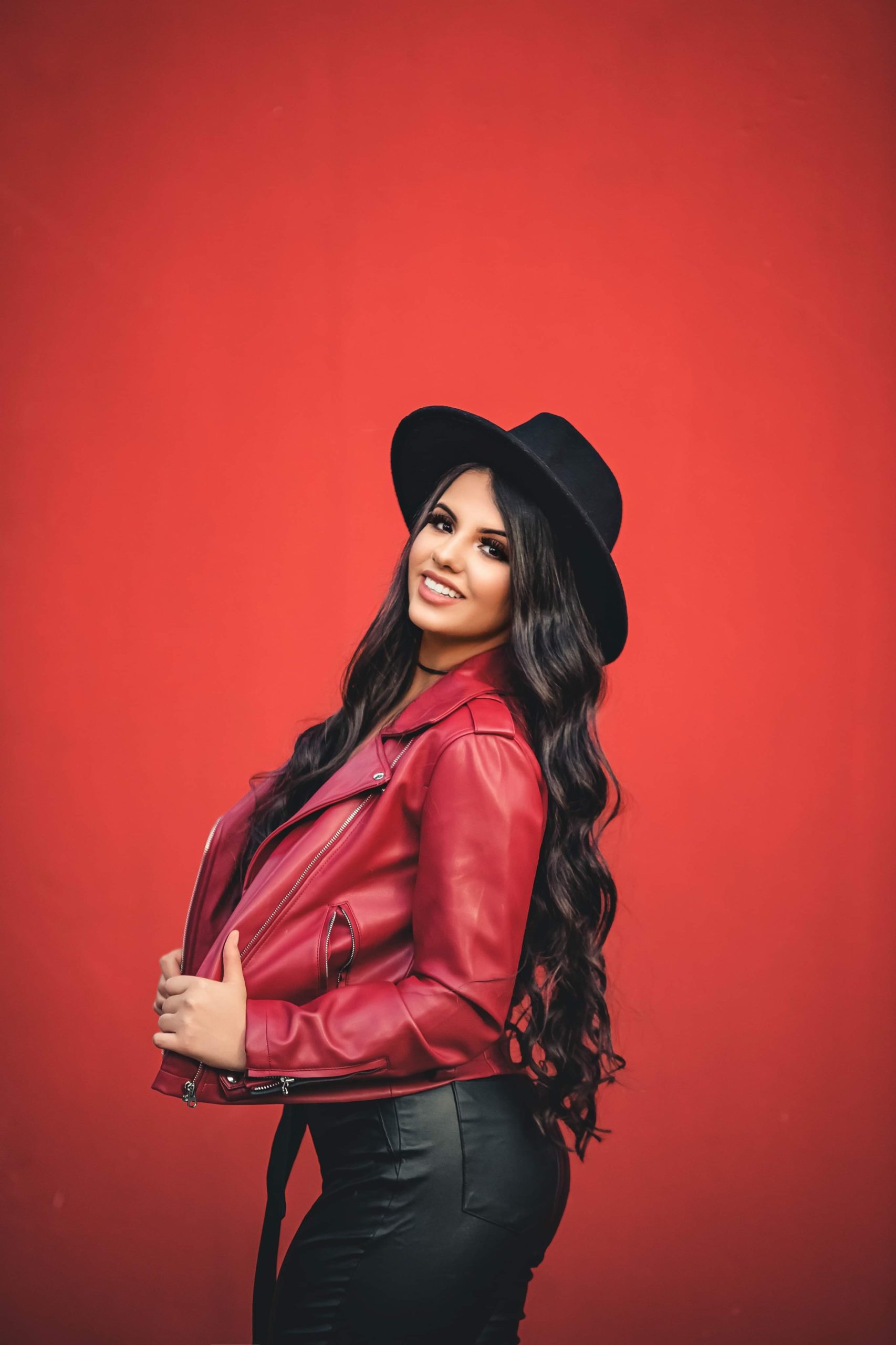 woman-poses-wearing-a-red-jacket-2887879 woman-poses-wearing-a-red-jacket-2887879