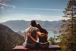 man-and-woman-sitting-on-bench-1417255-scaled